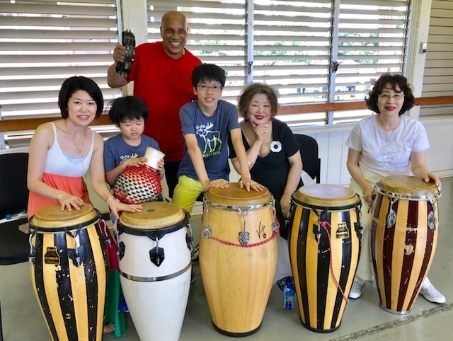 Students Playing Drums with Babasango