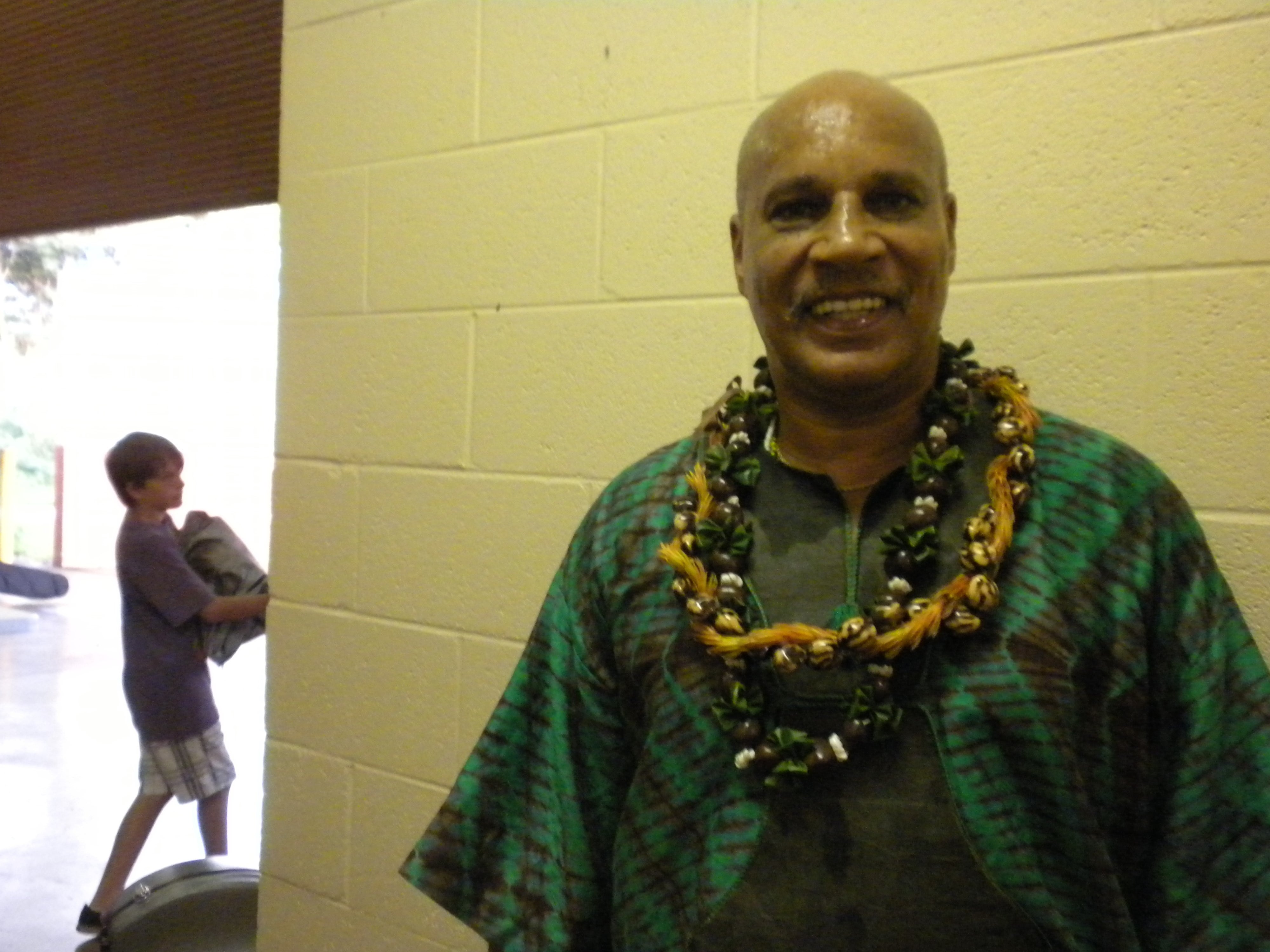 Babasango Wearing Green Shirt